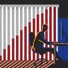 Hombre trabajando delante de la pantalla de su computadora
