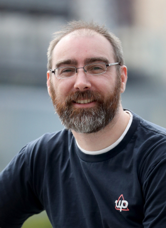Headshot of Dominic Pym