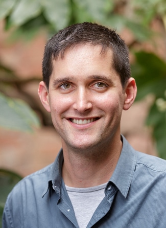 Headshot of Alex Holmes