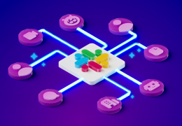 A picture of two women clapping at a conference next to a Dreamforce logo.