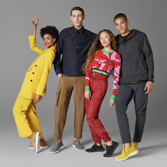 'A group of four people wearing Cole Haan’s sneakers.'