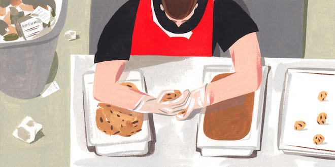 An overhead shot of someone making cookies.